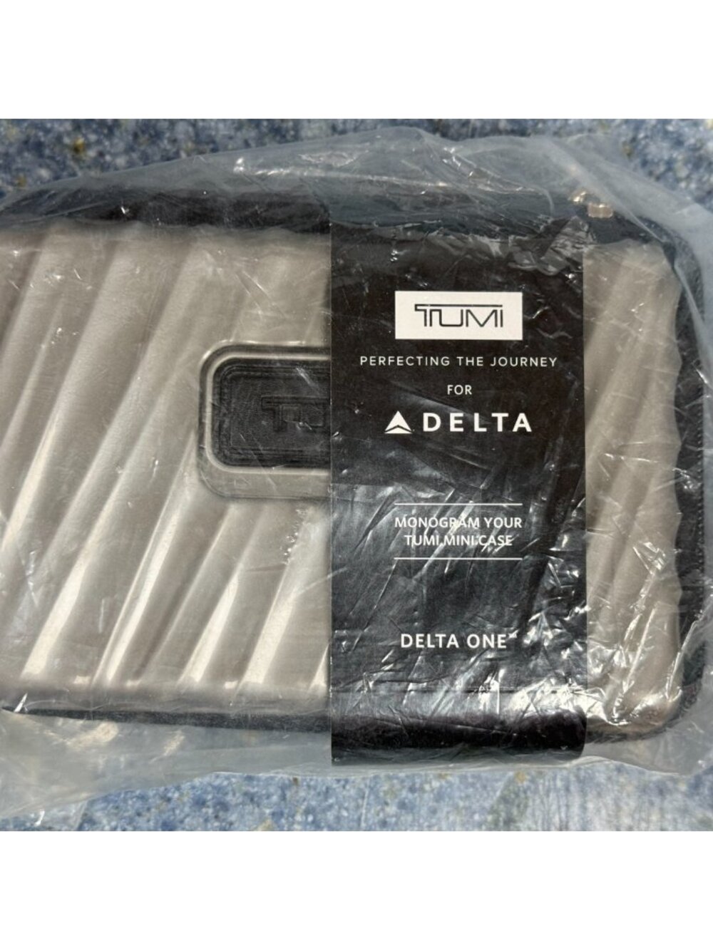 TUMI For DELTA SILVER Hard Shell Suitcase Amenity Travel Kit NEW IN PLASTIC